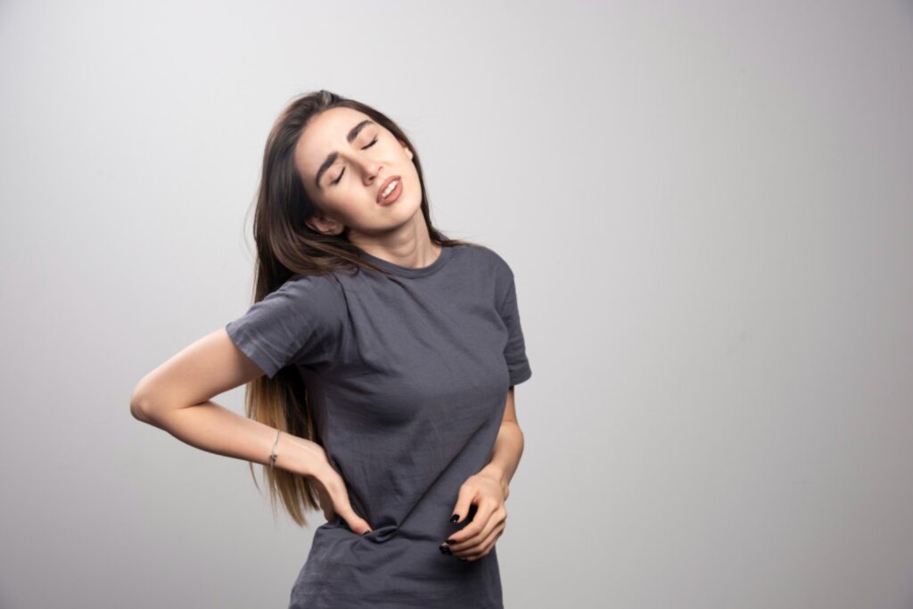 Patient experiencing pelvic pain and lower abdominal discomfort – specialized diagnosis and treatment at IBAP Clinics Hyderabad